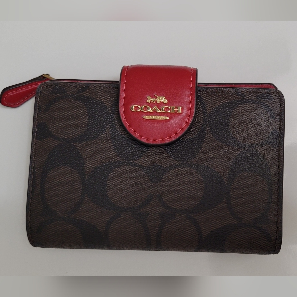 Coach medium zip wallet in Signature Canvas